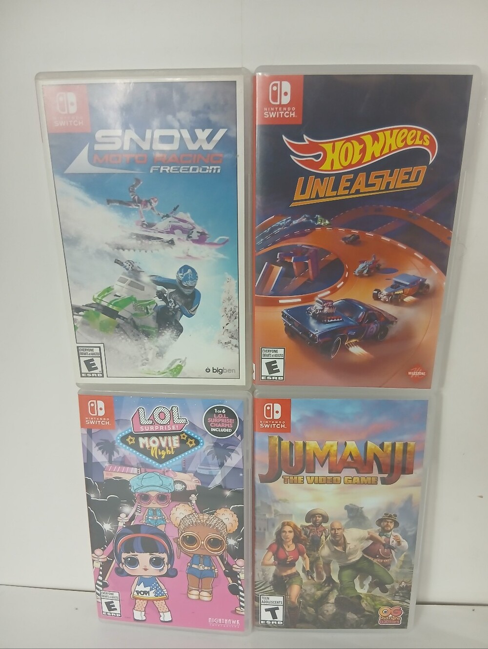 4 Nintendo Switch Games Hot Wheels, Jumanji, Snow Moto Racing Lol Suprise Movie